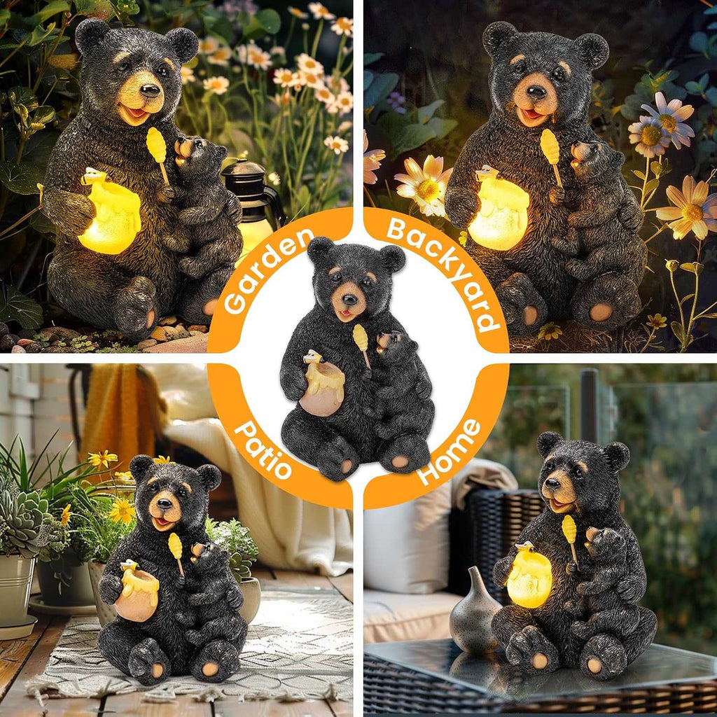 Hand-painted solar bear garden statue featuring mom and cub with solar-lit honey pot in a garden setting