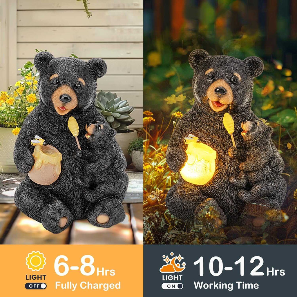 Hand-painted solar bear garden statue featuring mom and cub figurine with solar-lit honey pot in a garden setting
