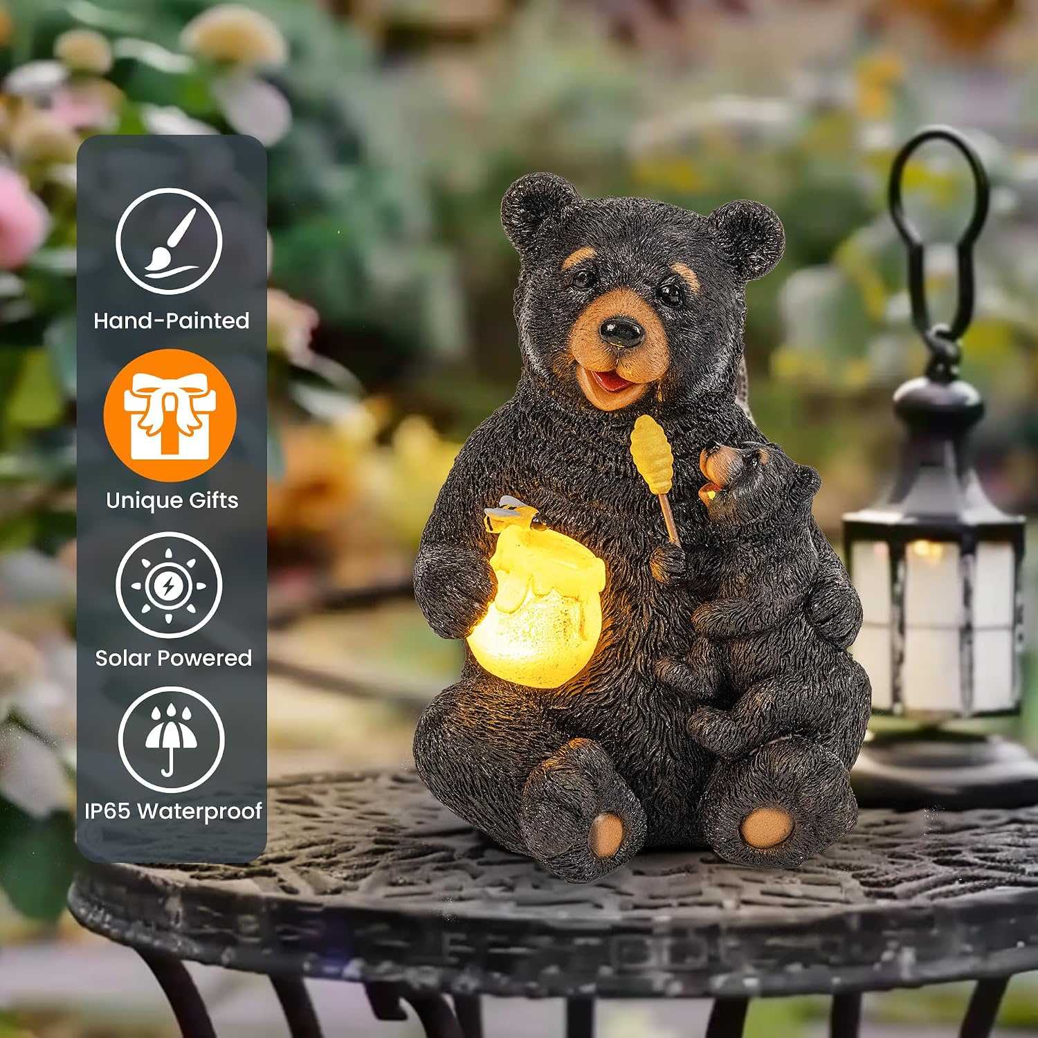 Hand-painted solar bear garden statue featuring mom and cub with soft solar-lit honey pot in outdoor setting