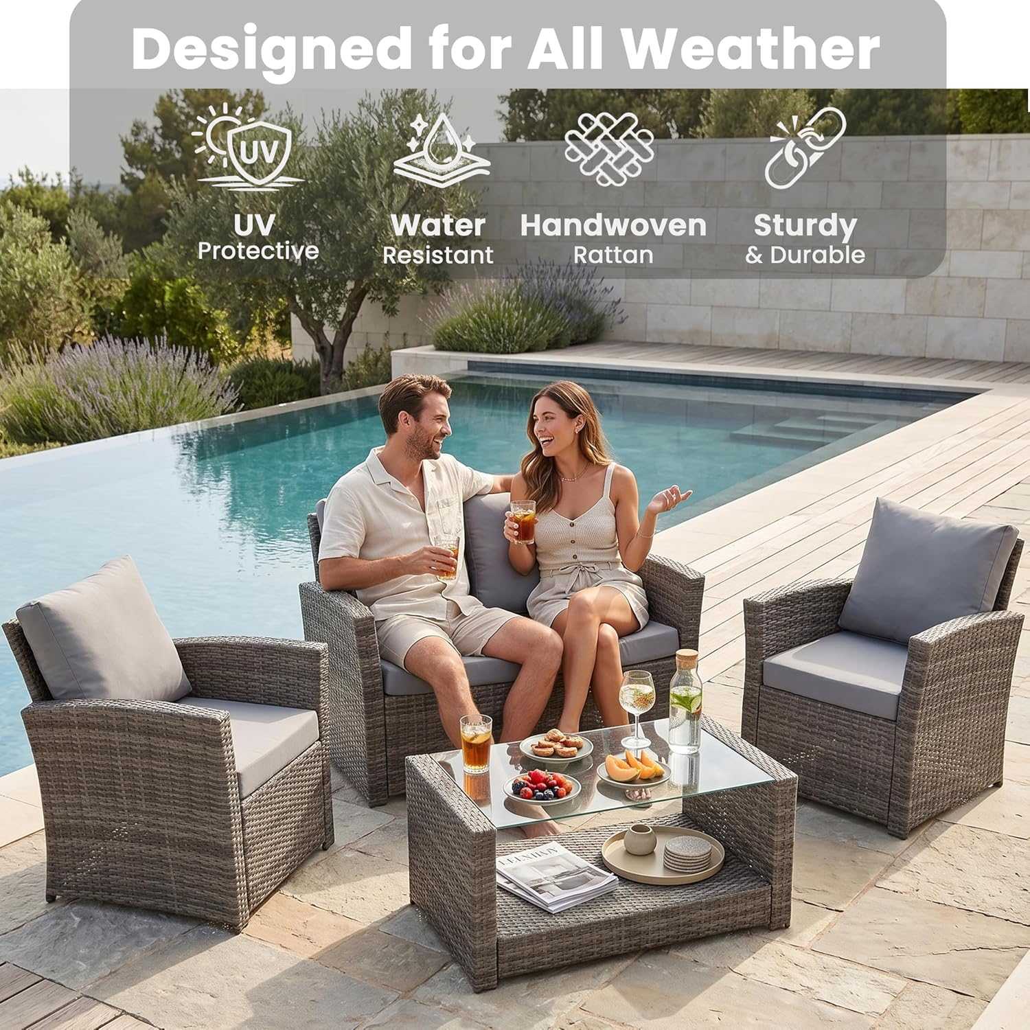 4 seater rattan garden sofa set with cushioned two-seater sofa, armchairs, and glass-top coffee table in outdoor patio setting