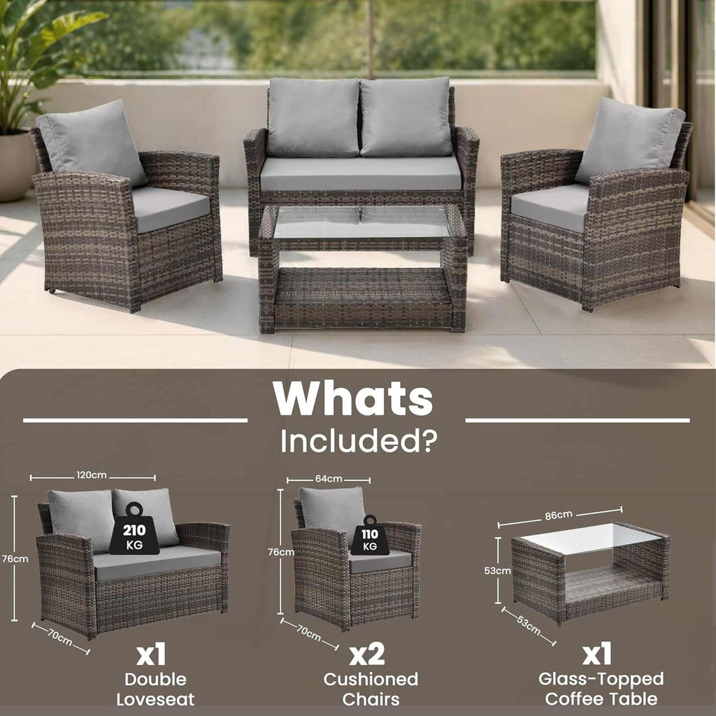4 seater rattan garden sofa set with cushioned two-seater sofa, armchairs, and glass-top coffee table in modern outdoor patio setting
