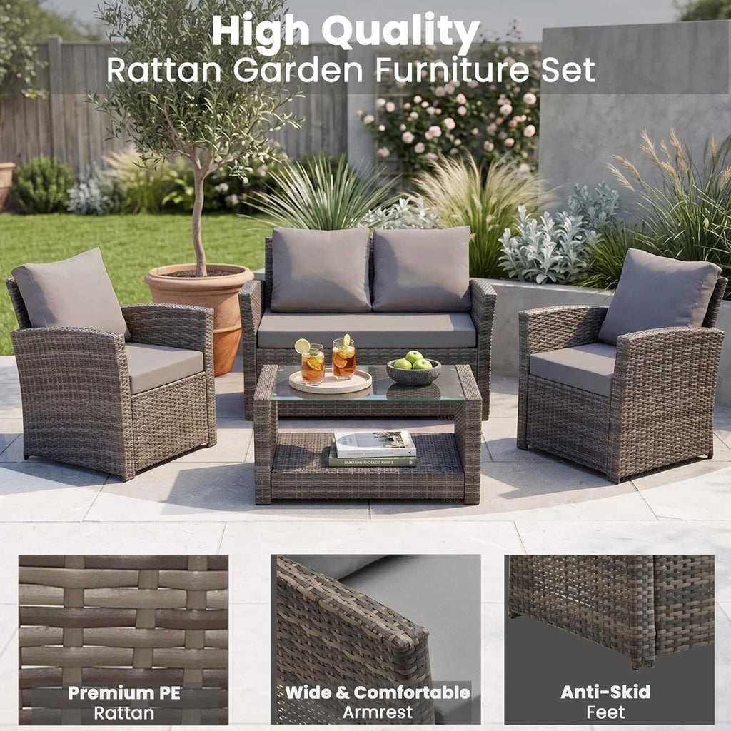 4 seater rattan garden sofa set with cushioned two-seater, armchairs, and glass-top coffee table outdoors