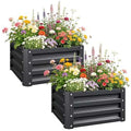 Set of 2 galvanized steel raised garden beds with waved design on patio