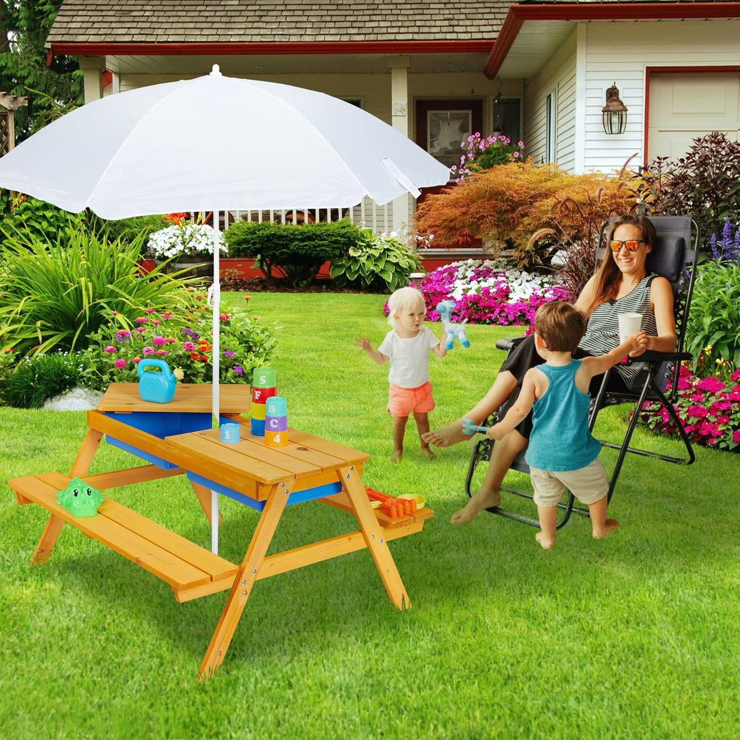 Kids garden picnic table with benches, parasol, and removable sand and water play tubs for outdoor fun