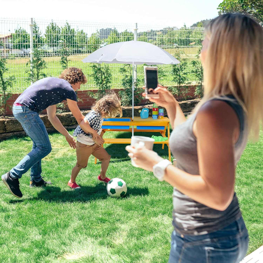 Kids garden picnic table with benches, parasol, and removable sand and water play tubs