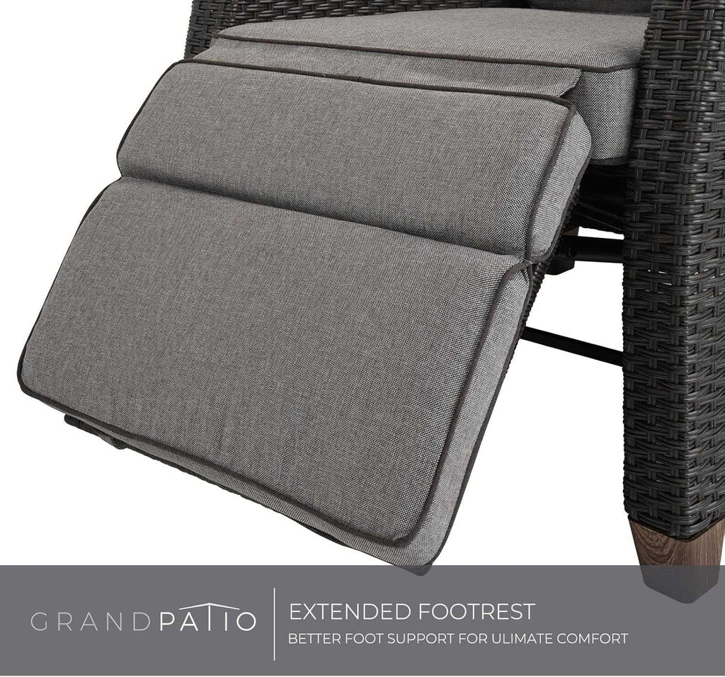 Outdoor reclining wicker lounge chair with adjustable reclining, cushion, and flip-up side table on patio