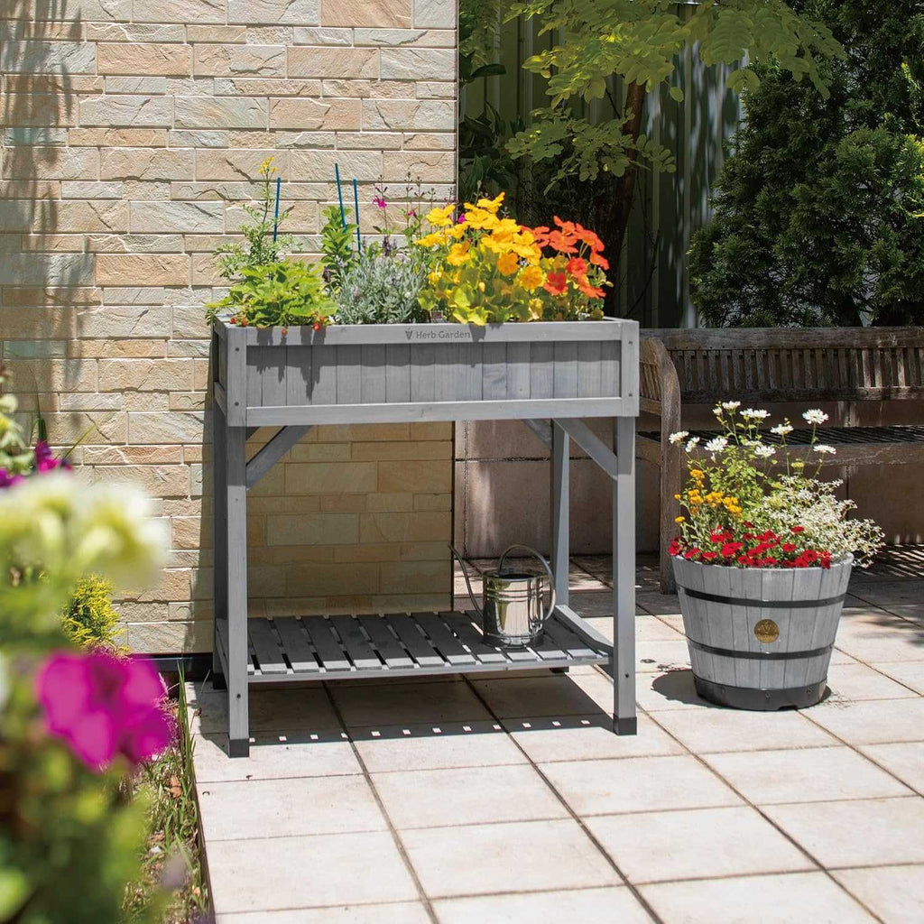 8-Pocket Raised Herb Planter in grey wash wood with eight compartments for growing herbs at comfortable height